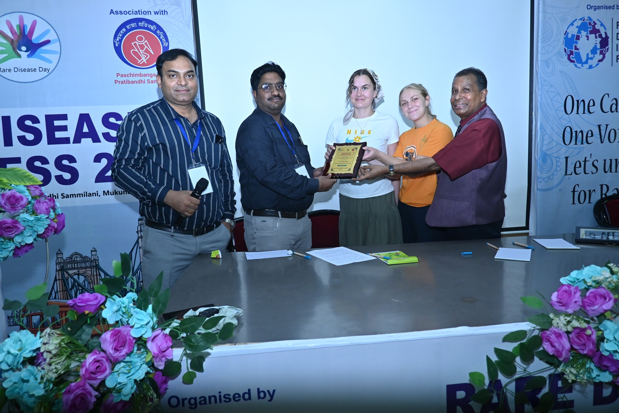 A view of the main stage and event banner for Rare Diseases Awareness 2025.